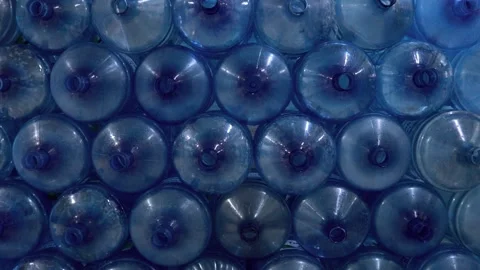 Large plastic empty bottle. A range of custom made empty 5 gallon  Stock Footage 158338878