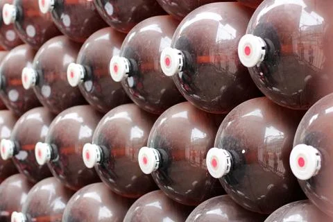 Large plastic kegs for beer, empty stand in a row. beer kegs plastic on 30 li Stock Photos