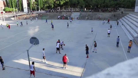 A large playground where there are people enjoying playing  together Stock Footage 133172808