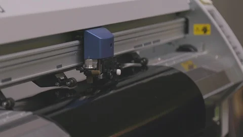 Large Plotter Cutting Design into Vinyl Stock Footage 87096150
