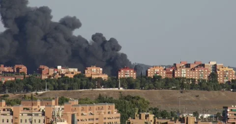 Large plume of dense smoke from a fire Stock Footage 277933541