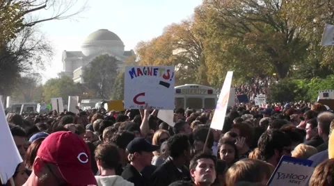A large political rally with signs on the mall in Washington D.C. Stock Footage