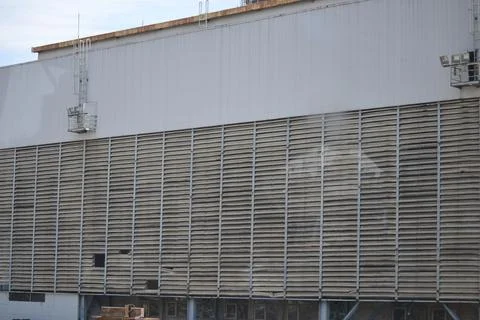 Large, poorly maintained vent in the old building Stock Photos