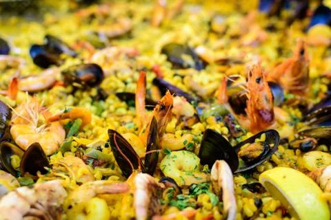 Large portion of traditional Spanish paella dish freshly being cooked Stock Photos