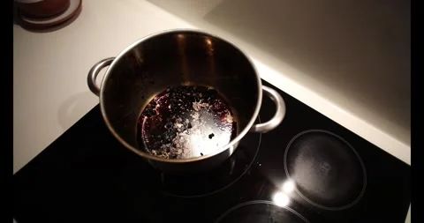 Large pot burned inside with chickpeas Stock Footage 271063267