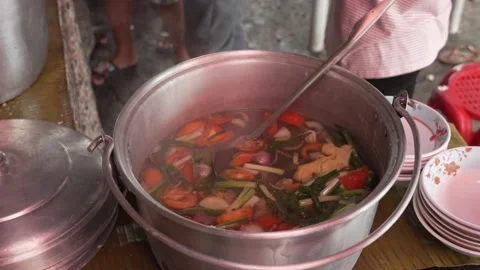 Large pot of shellfish being cooked &amp; served, Cebu City, Philippines Stock Footage 170293876