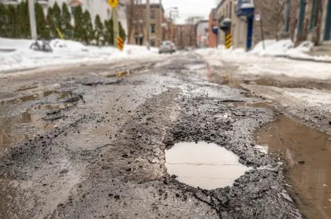 Large pothole Stock Photos