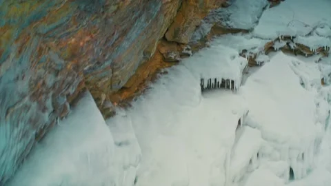 A large powerful block of ice in close-up on Lake Baikal. Siberia, Russia. Drone Stock Footage 223710664