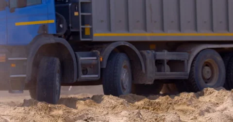 Large, powerful, cargo truck is driving in reverse to the place of loading  Stock Footage 161985309