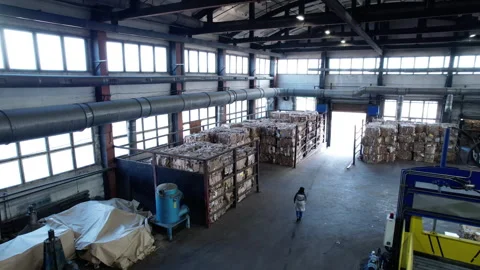 Large preparatory warehouse containing stacks of waste paper Vídeos de archivo 294202553