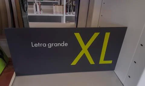 Large-print sign board over library shelf Stock Photos