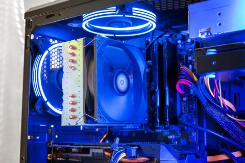 Large processor cooler on a modern gaming computer with RGB illumination. Det Foto stock