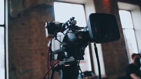 Large professional video camera on a tripod Stock Footage 159912603