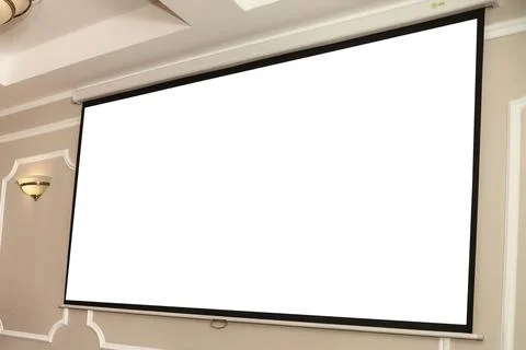 Large projection screen on beige wall, presentation board, blank whiteboard o Stock-Fotos