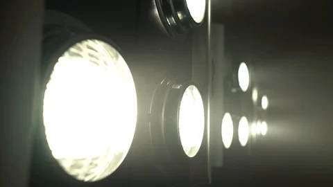 Large projectors with flickering light create color music . Close up Stock Footage 92865001