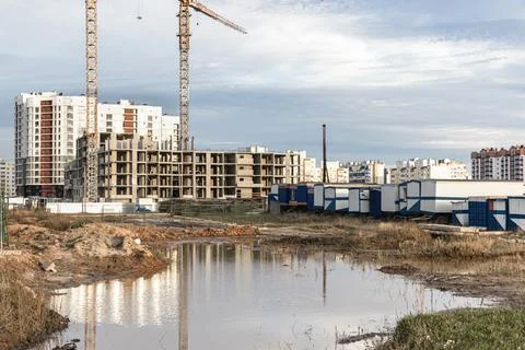 A large puddle after rain at the construction site Photos