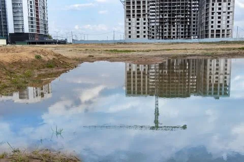 A large puddle after rain at the construction site Stock Photos