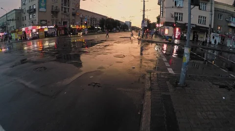 Large puddles on the asphalt of the street intersection Stock Footage 127955318