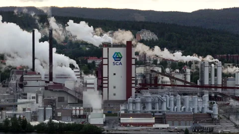 Large Pulp Mill Operating With Vapor Rising From Industrial Site, Aerial Stock Footage 345208637