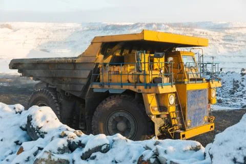 Large quarry dump truck. Loading the rock in dumper. Loading coal into body Fotos Stock