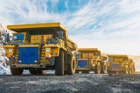Large quarry dump truck. Loading the rock in dumper. Loading coal into body Fotos Stock