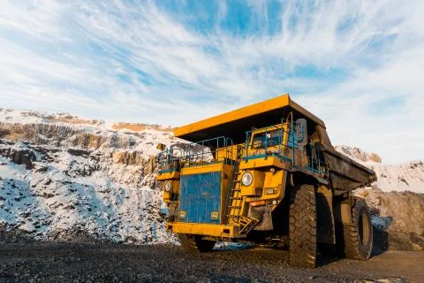 Large quarry dump truck. Loading the rock in dumper. Loading coal into body 写真素材