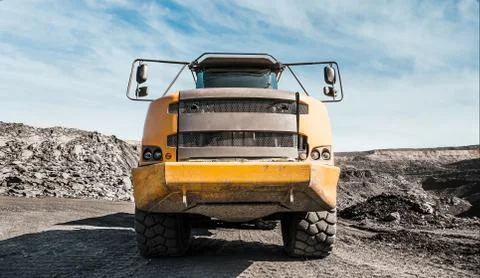 Large quarry dump truck. Loading the rock in dumper. Loading coal into body Stock Photos