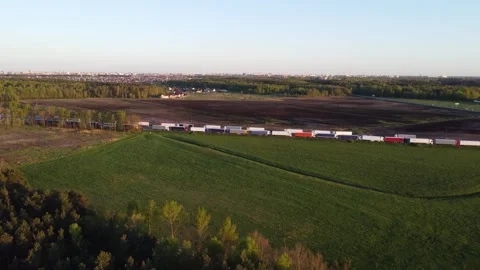 Large queue of heavy trucks. Transport collapse before border. Drivers strike Stock Footage 319894775