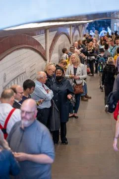 A large queue of people along the South Bank of the River Thames to see the Q Stock Photos