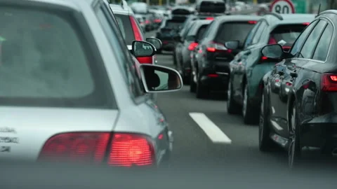 Large queue of vehicles on motorway pay toll in summer Stock Footage 251177397