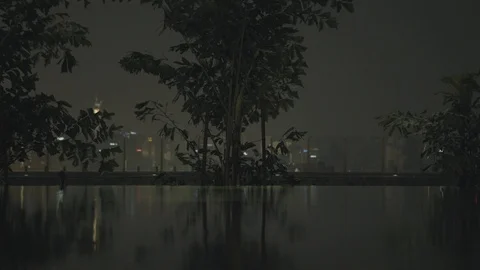 Large quiet rooftop pool by night Stock Footage 125753142