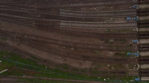 Large railway sorting station. A lot of cars, rails, buildings. View from the Vídeos de archivo 134444690