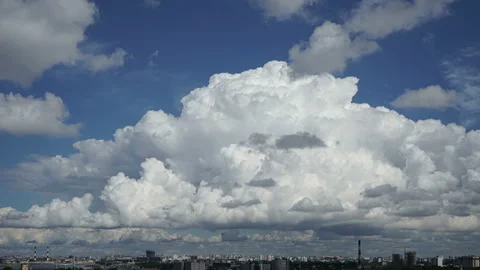 Large rain cloud formed and it began to rain over the city of Saint Petersburg Stock Footage 135764985