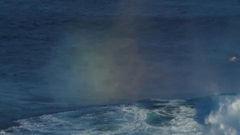 Large Rainbow Wave with Spray Stock Footage 100998502