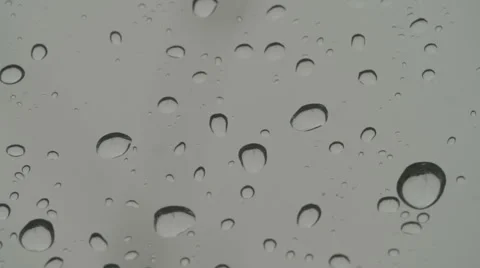 Large raindrops on window 스톡 동영상 52178680