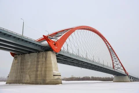 The large red arch bridge in winter close-up Stock Photos