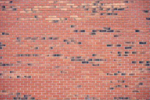 Large red brick wall Stock Photos