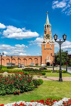 A large red building with a clock tower in Kremlin in Moscow Russia Stock Photos