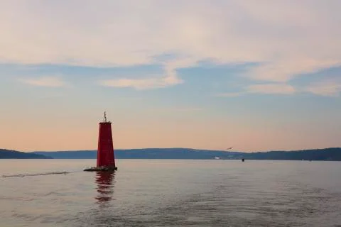 A large red buoy marks the entrance of Cayuga Inlet off Cayuga Lake Stock Photos