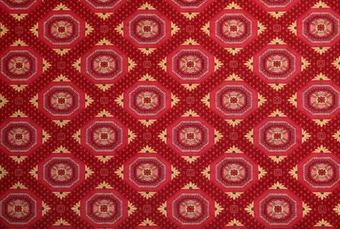 Large red carpet with checkered patterns Stock Photos