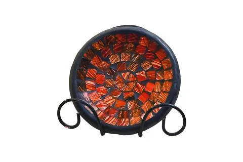 Large red ceramic plate with arabic patterns, isolated on a white background. Stock Photos