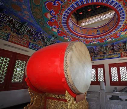 Large red drum decorated inside chinese temple for ceremonial purposes Stock Photos
