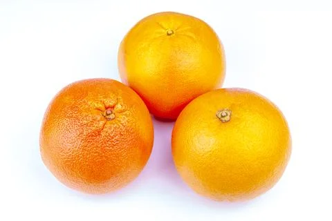 Large red grapefruits on a table Stock Photos