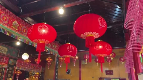 Large red lanterns adorn monasteries during Chinese New Year celebrations Stock Footage 288432122