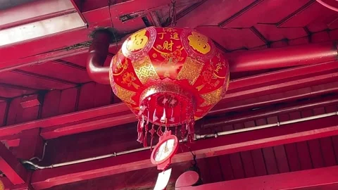 Large red lanterns adorn monasteries during Chinese New Year celebrations Stock Footage 288432156
