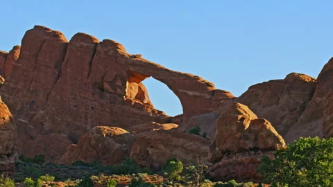 Large red rock arch and balanced rocks in Arches National Park, Utah Stock-Footage 258866047