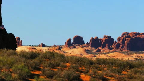 Large red rock pinnacles and balanced rocks in Arches National Park, Utah Stock-Footage 258871024