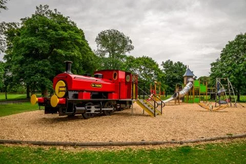 Large red train in Seaton park outdoor children playground, Aberdeen Stock Photos