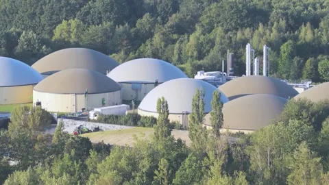 Large Renewable Biogas Facility with Multiple Digester Tanks in Rural Area Stock Footage 345300601