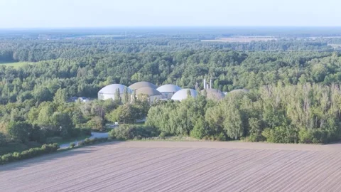 Large Renewable Biogas Facility with Multiple Digester Tanks in Rural Area Stock Footage 345300608